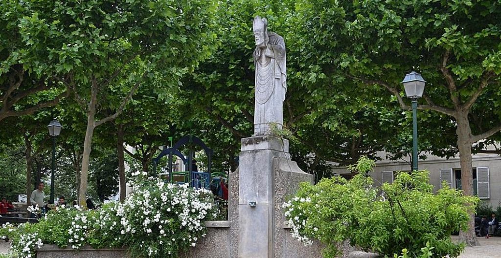 Monument to St Dionysius. Tourist streets in Paris